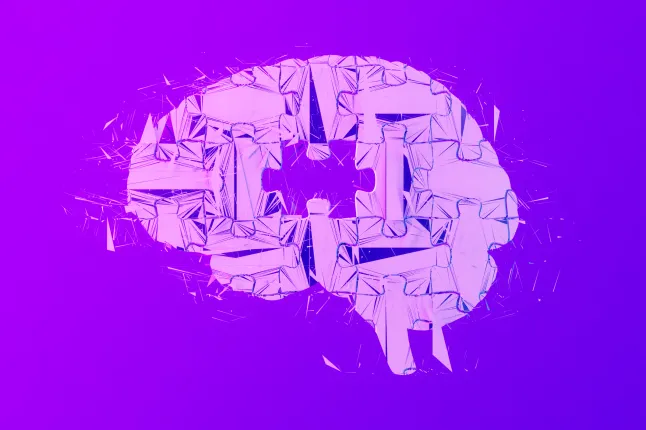 Un cerveau de dessin animé avec une pièce de puzzle manquante, pour indiquer un manque de dopamine.