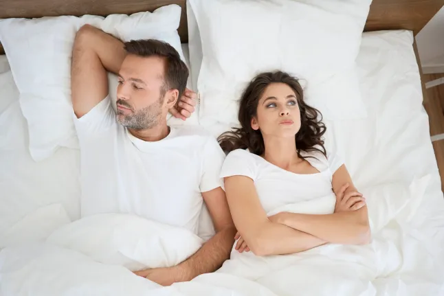 Couple frustré au lit